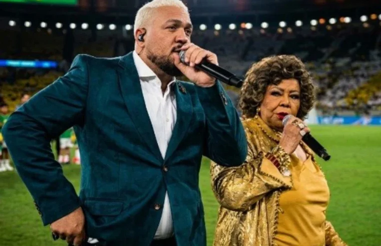 Alcione explica confusão com Belo na apresentação do hino nacional em amistoso da seleção